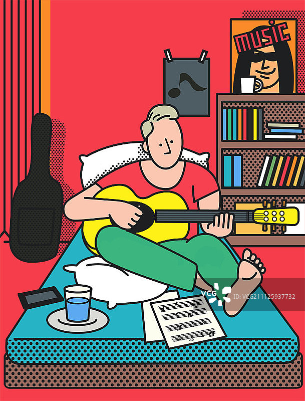 男人在床上弹吉他图片素材