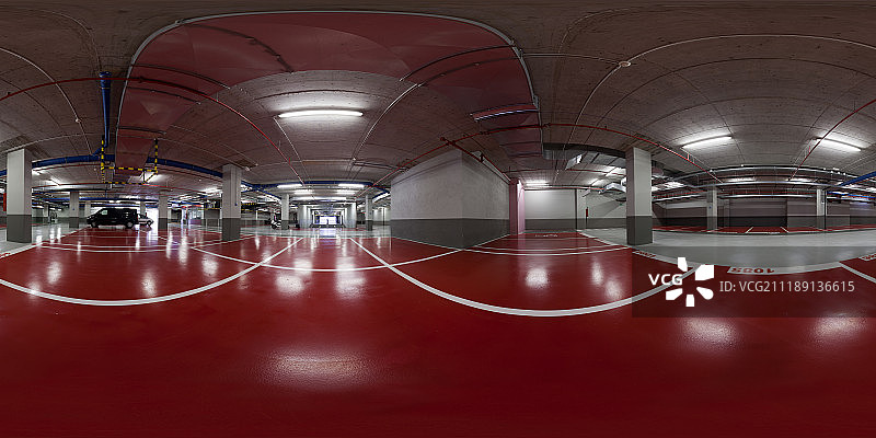 360掳 HDRI showing an indoor car park with red painted floor in Barcelona, Spain图片素材