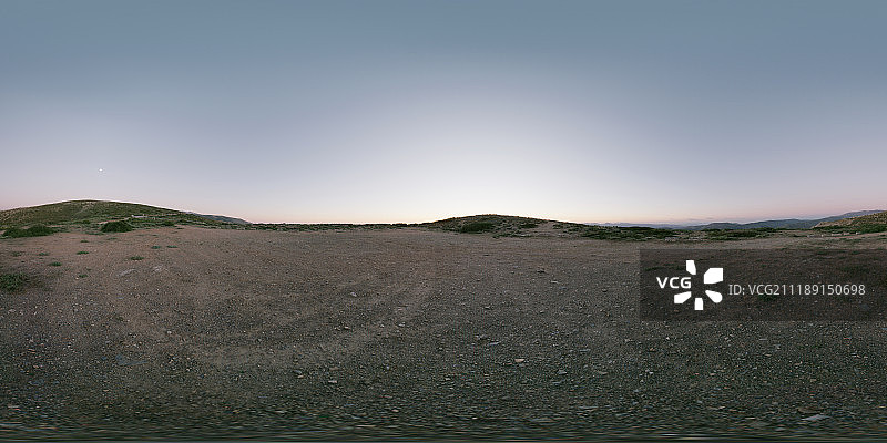 360掳 HDRI showing a dirt plateau with a view of a sunset in Spain图片素材