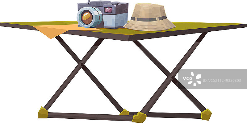 游客桌子与相机和帽子隔离图片素材