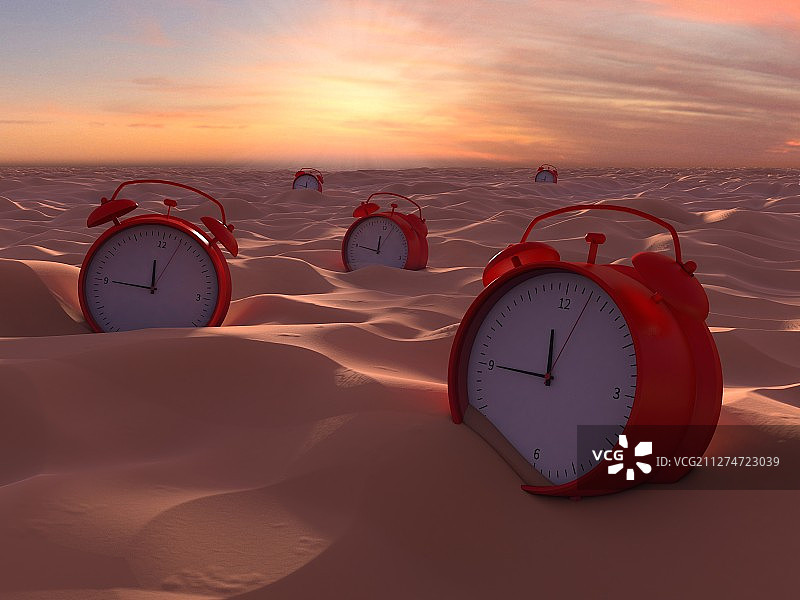 沙漠中的闹钟图片素材
