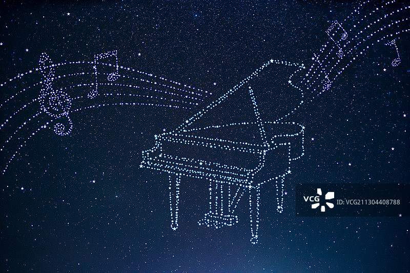 星空里的钢琴和五线谱图片素材
