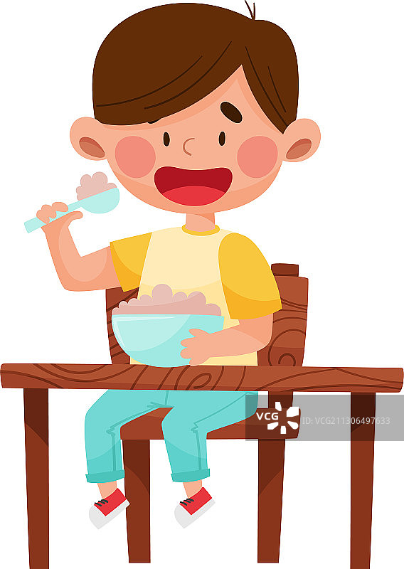 男孩性格坐在桌子旁吃粥图片素材