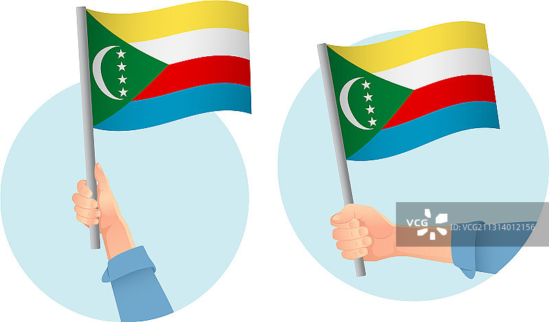 手握科摩罗国旗的图标图片素材