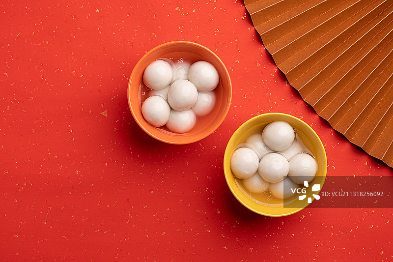 中国传统节日红色背景喜庆春节元宵节冬至中秋节福字碗里的汤圆图片素材