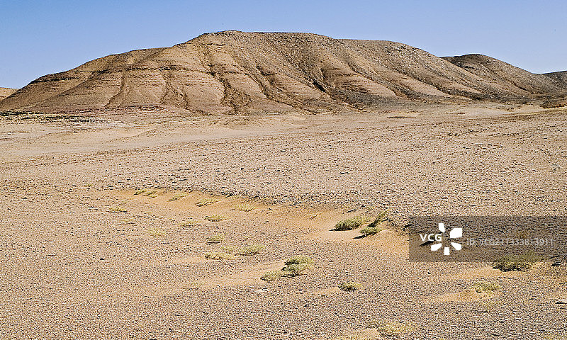 阿尔及利亚恩阿杰耶塔西里沙漠的沙子和岩石群图片素材