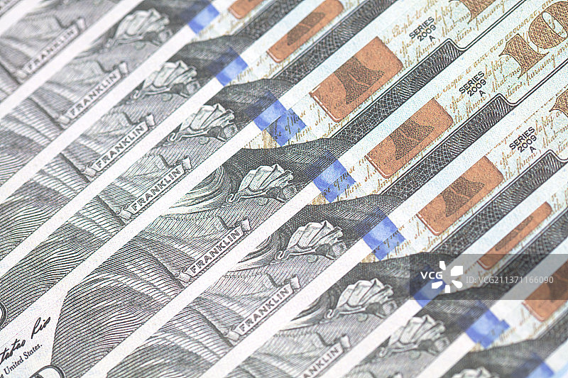 整齐排列的一百美元钞票背景图片素材