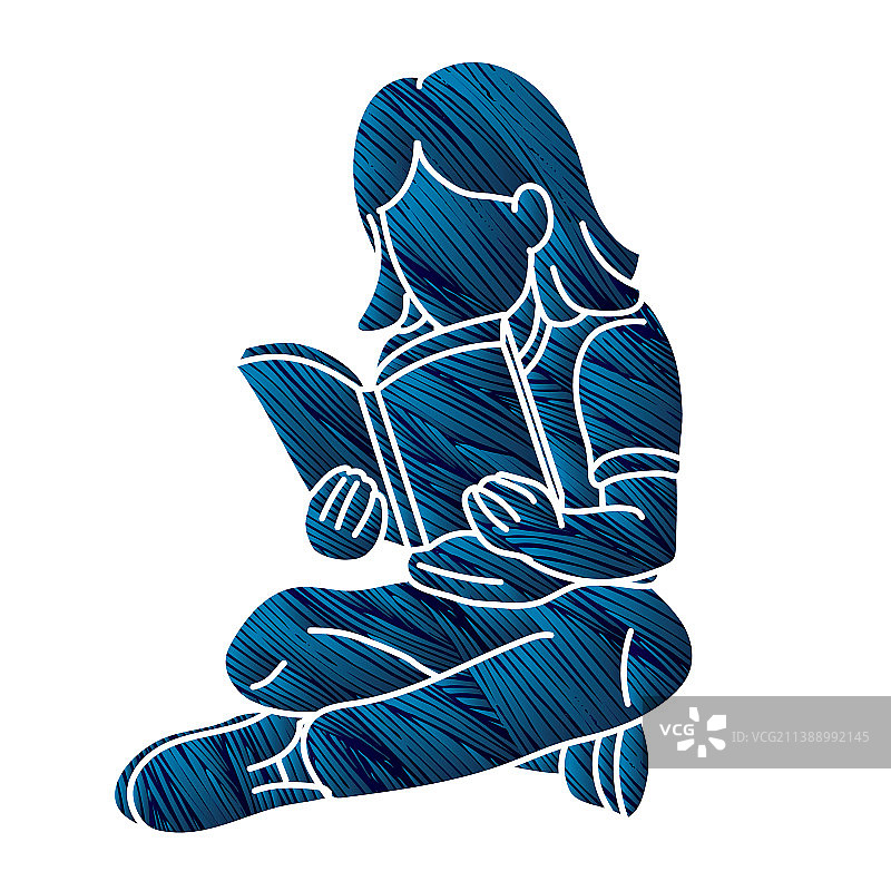 一个小女孩正在阅读一本儿童学习的书图片素材