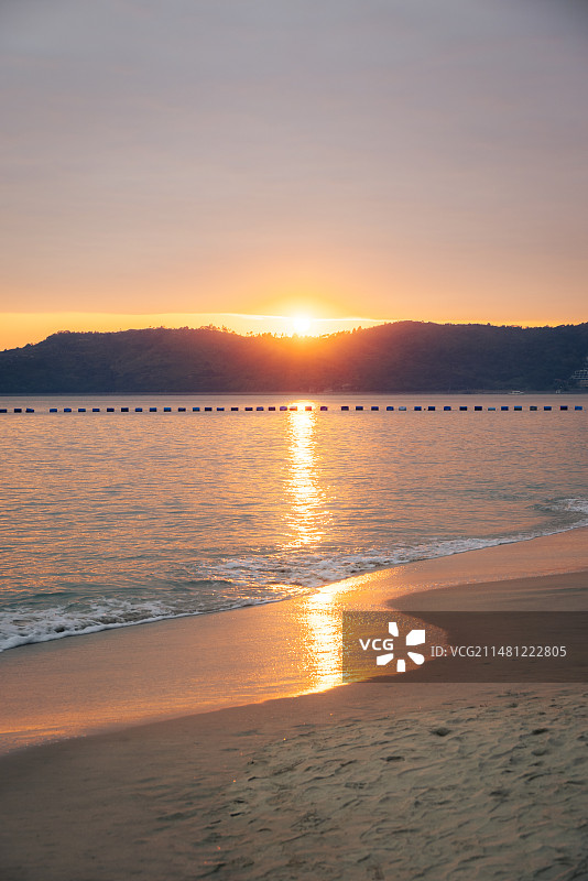 惠州十里银滩沙滩上的夕阳图片素材