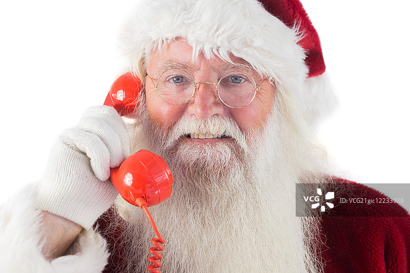 圣诞老人的红色手机，白色背景图片素材