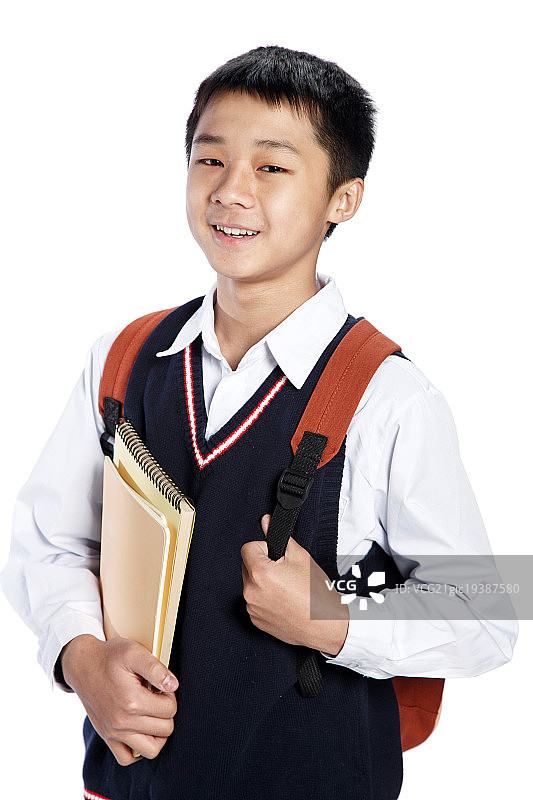一个中学男生背着书包图片素材