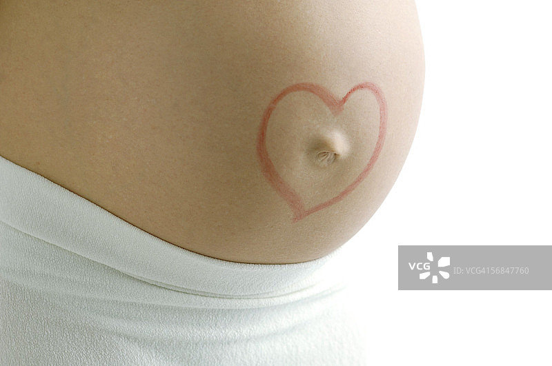 孕妇腹部有心脏，腹部中段，特写图片素材