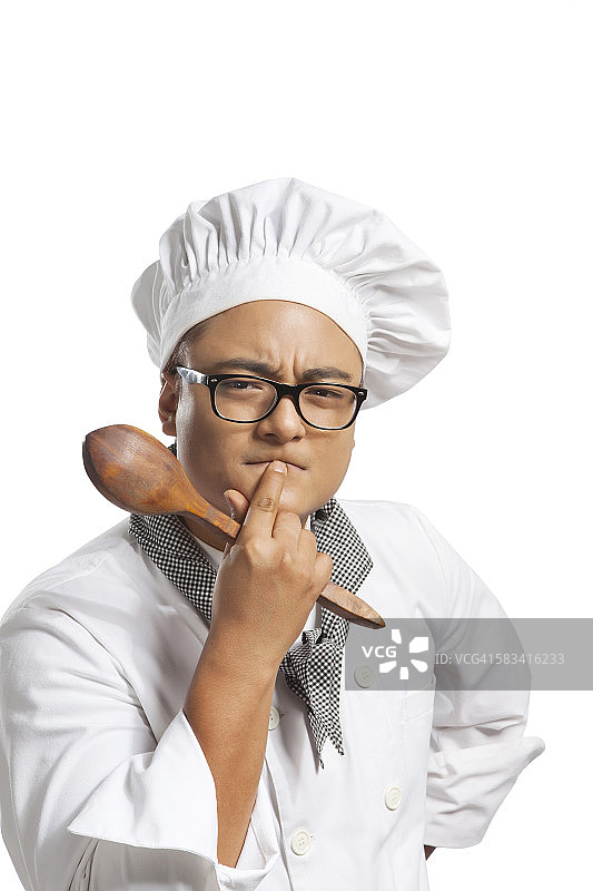 厨师用木勺思考的肖像图片素材