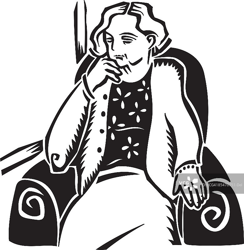 一位坐在扶手椅上思考的老妇人图片素材