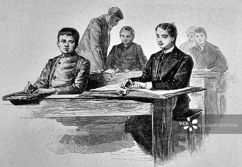 维多利亚时代的青少年在学校学习- 1895年图片素材