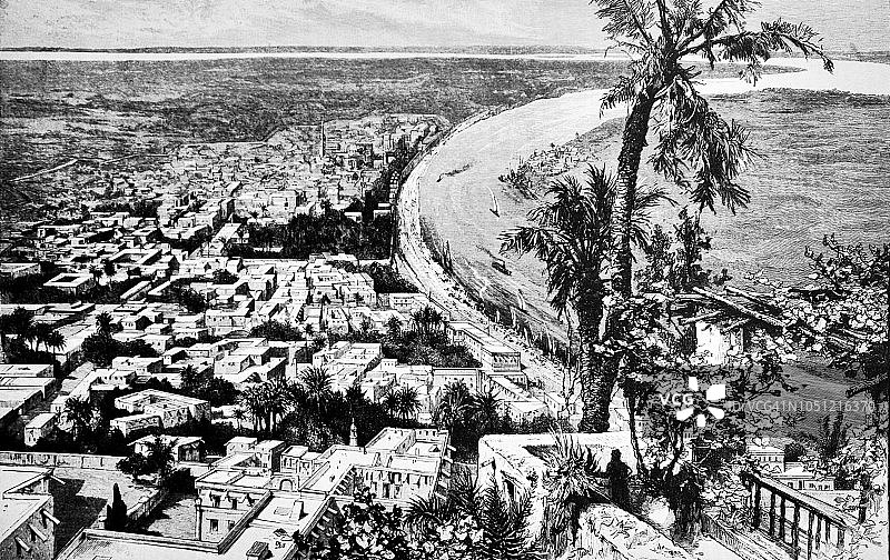 拥有棕榈树和河流的东方城市——1888年图片素材