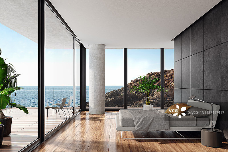 现代豪华卧室在海边别墅与黑色的石墙图片素材