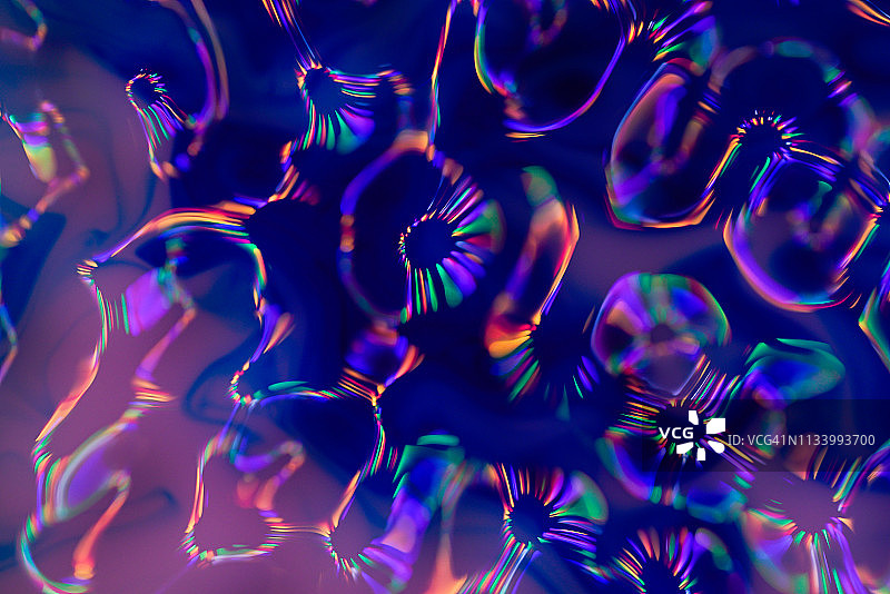 彩色的cymatic图案的声音被水反射图片素材