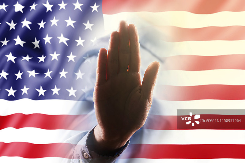 USA FLAG with hand STOP SIGN / FLAG concept(点击查看更多)图片素材