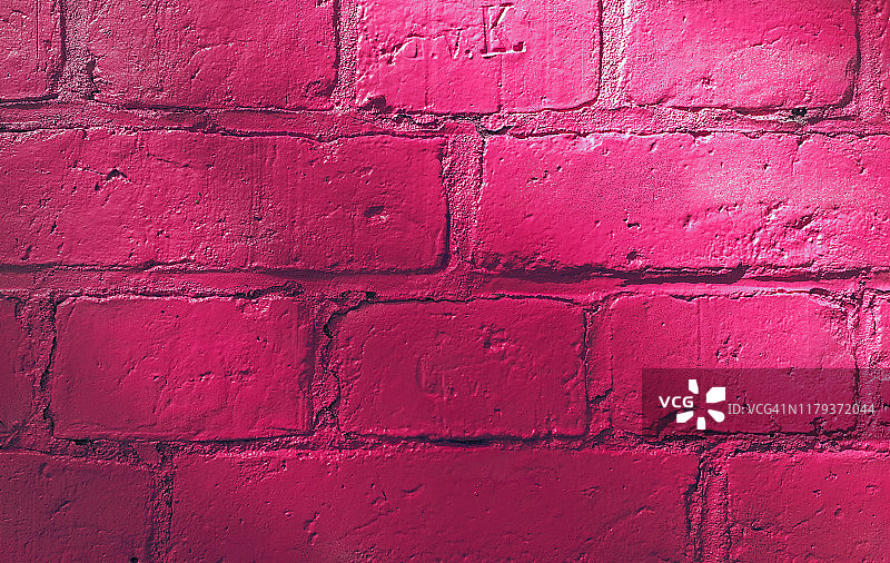 粉刷成粉红色的砖墙图片素材