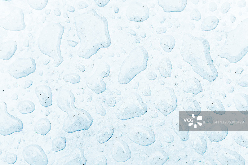 蓝色表面上的水滴图片素材