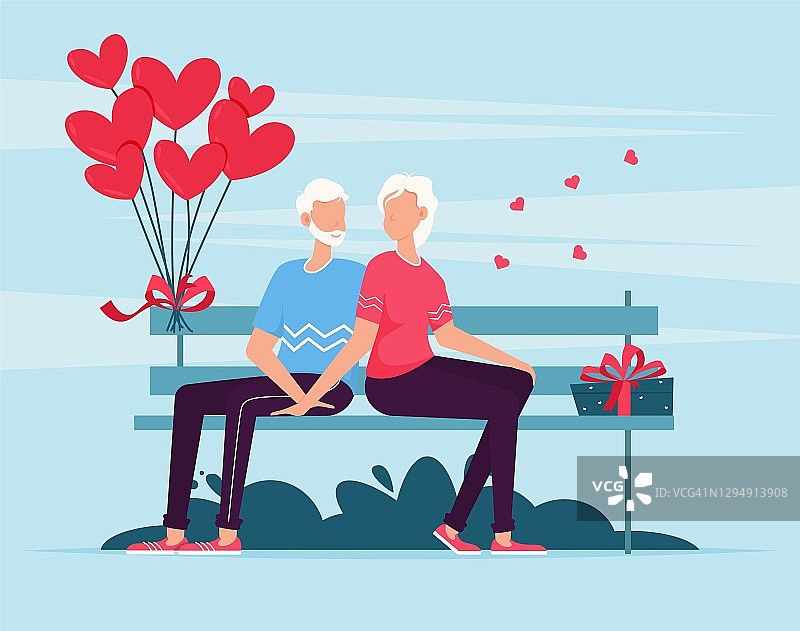 老夫妇坐在长椅上。坐在长椅上的恩爱夫妻。情人节图片素材