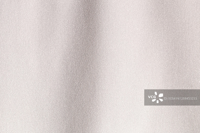 白色织物布料聚酯纹理背景。图片素材