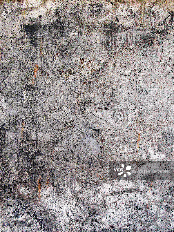 马提尼克岛风化开裂的混凝土墙，橙色油漆图片素材