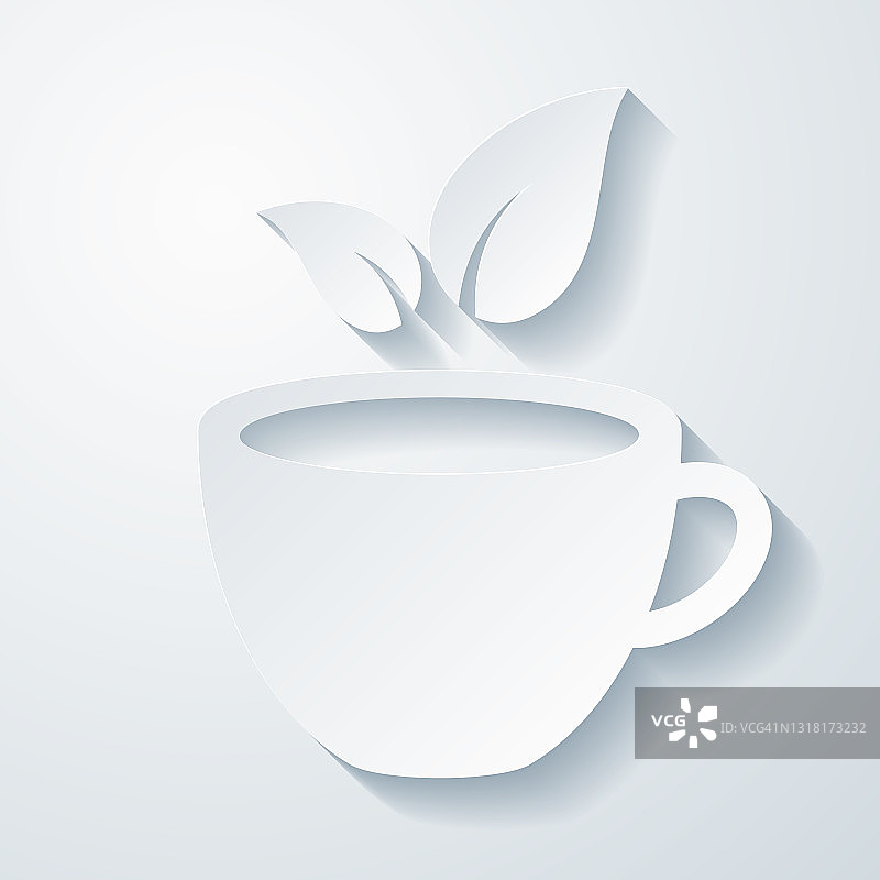 茶杯和茶叶。在空白背景上具有剪纸效果的图标图片素材