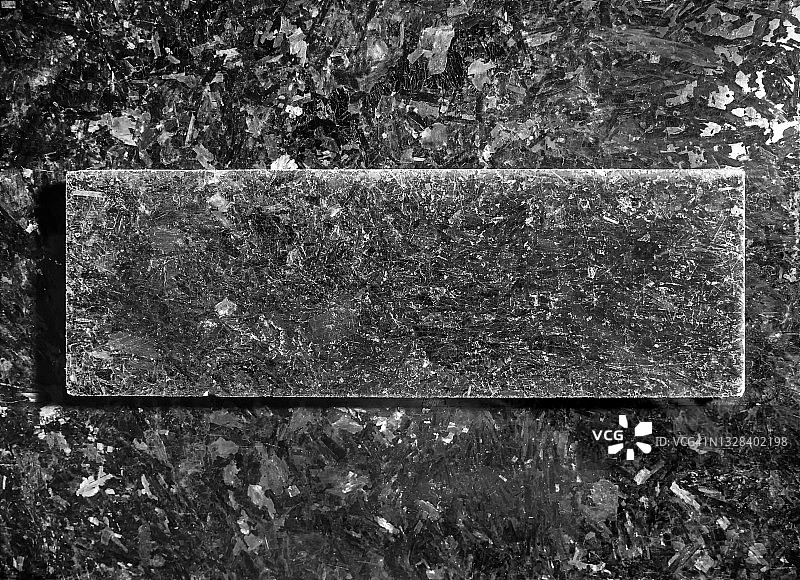 大理石花岗岩的背景纹理。破旧的黑色天然石板与文字空间图片素材