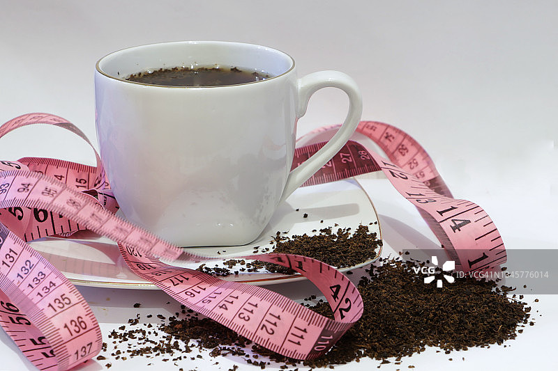 红茶与白底卷尺，饮食养生理念图片素材
