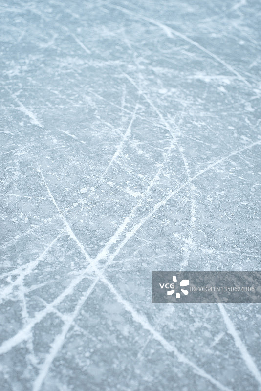 背景冰上溜冰场的痕迹滑冰，冬季运动图片素材