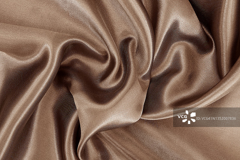 深棕色织物质地背景，丝质或亚麻布图案细节。图片素材