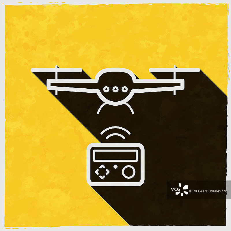 遥控无人驾驶飞机。图标与长阴影的纹理黄色背景图片素材