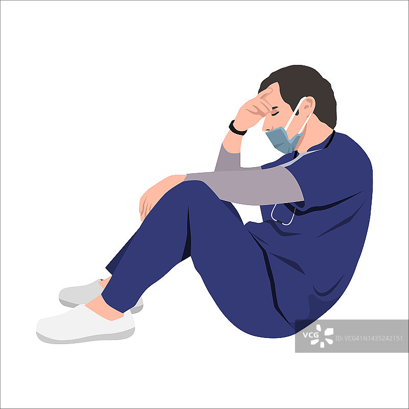 精疲力竭的医生坐在医院走廊的地板上。COVID-19,冠状病毒大流行。疲惫的医务人员在哭泣。图片素材