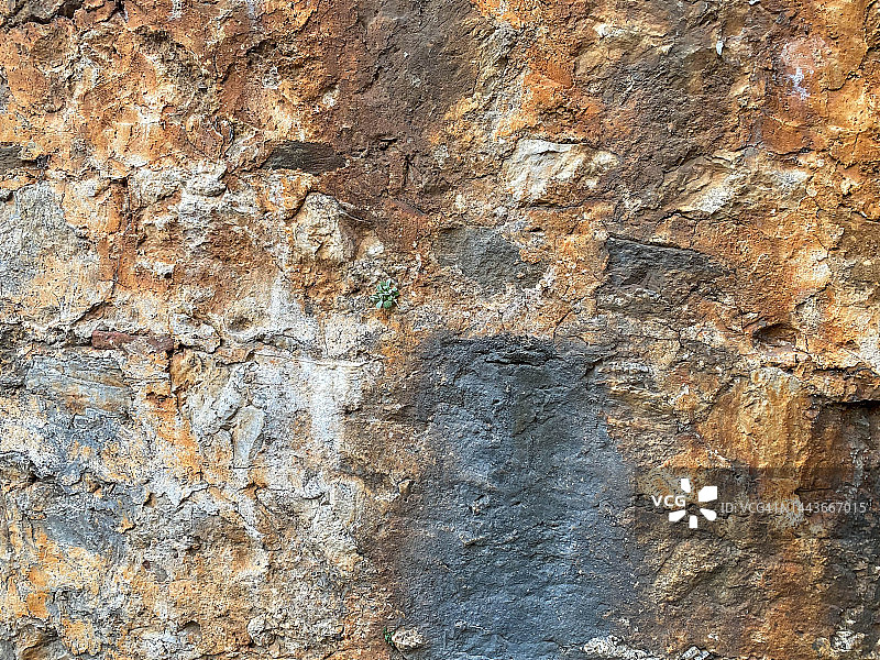 背景、纹理、石材天然黄红表面自然锐凸粗糙鹅卵石石带裂缝图片素材