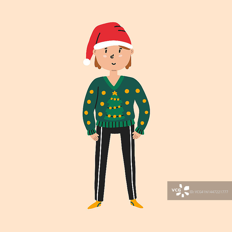 男孩穿着丑陋的圣诞毛衣图片素材