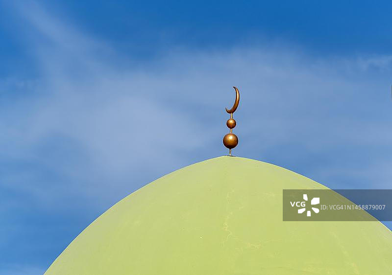 阿曼伊斯兰清真寺的绿色圆顶特写图片素材