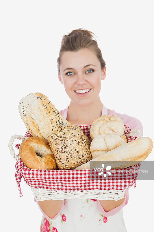 拿着面包篮的少女图片素材