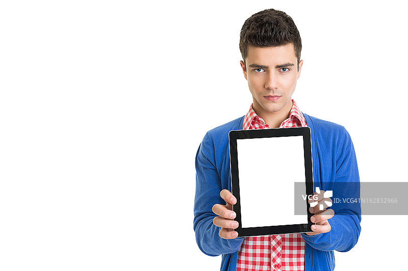 年轻时尚男子展示数码平板电脑图片素材