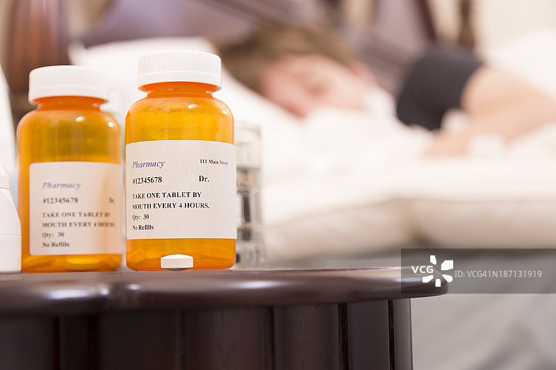 医疗保健:患流感卧床不起的病人。的药物。图片素材