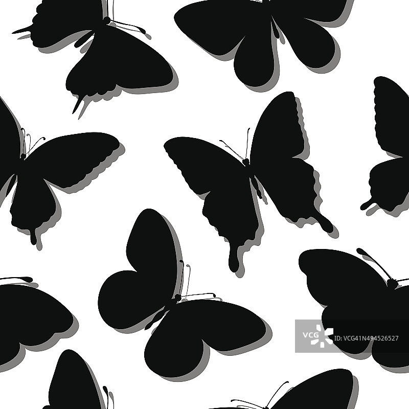 美丽的无缝背景与蝴蝶的剪影。图片素材