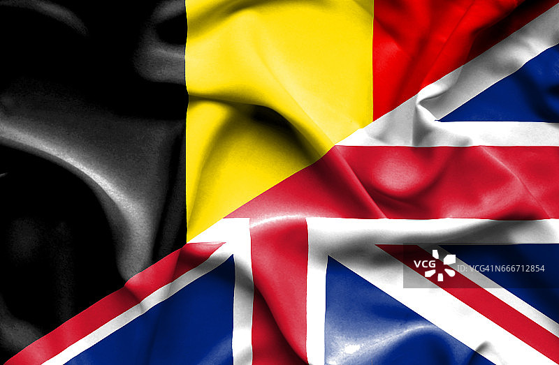 挥舞着英国和比利时的旗帜图片素材