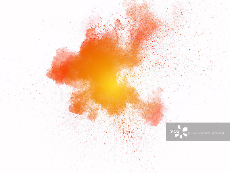 黄色和橙色的粉末在白色的底部爆炸的形式和纹理图片素材