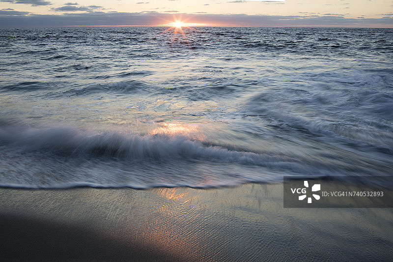 日落在海滩上，拉霍亚，加州，美国图片素材