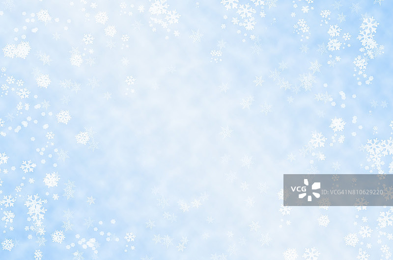 雪花落在蓝色的背景上图片素材