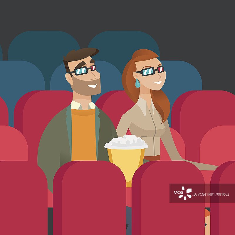 一对白人夫妇在电影院看3D电影图片素材