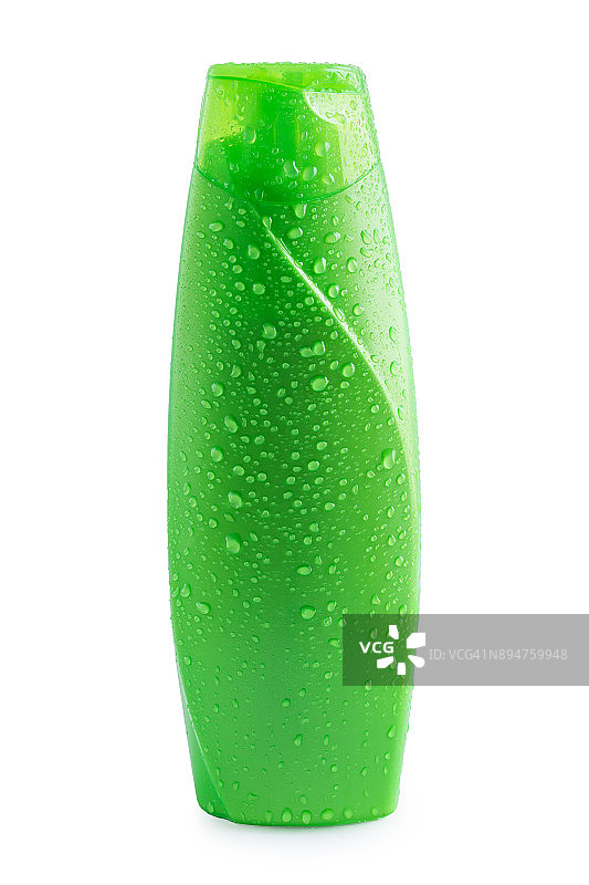 绿色塑料瓶洗发露，白色滴上水滴图片素材