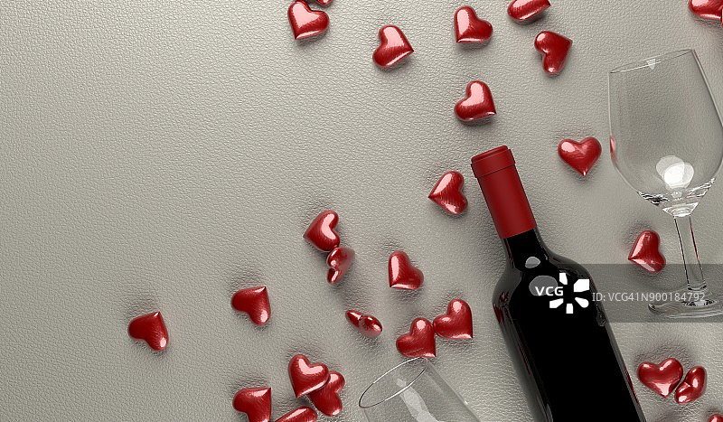 红酒瓶，玻璃和红心图片素材