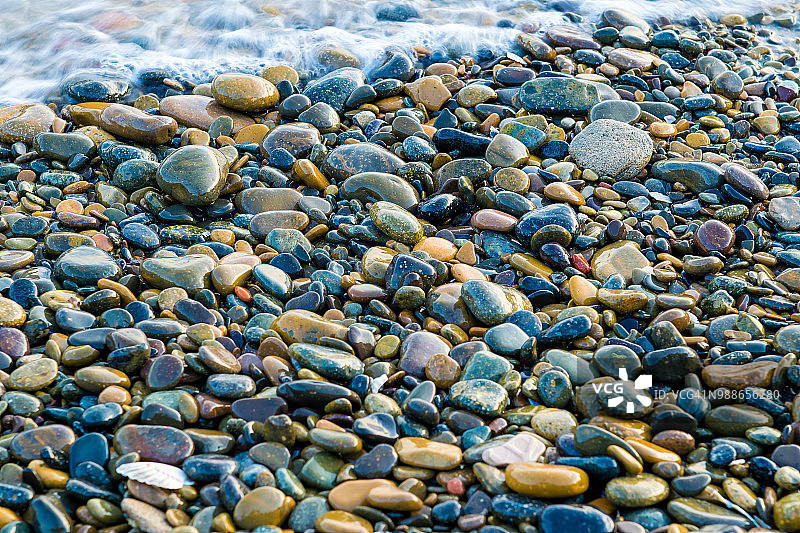 卵石覆盖着水的全帧镜头图片素材
